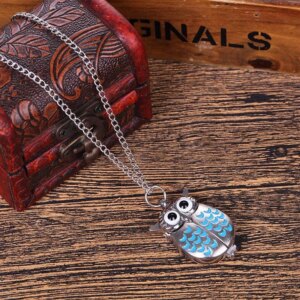 Montre de poche hibou argenté, pendentif aux ailes ouvertes