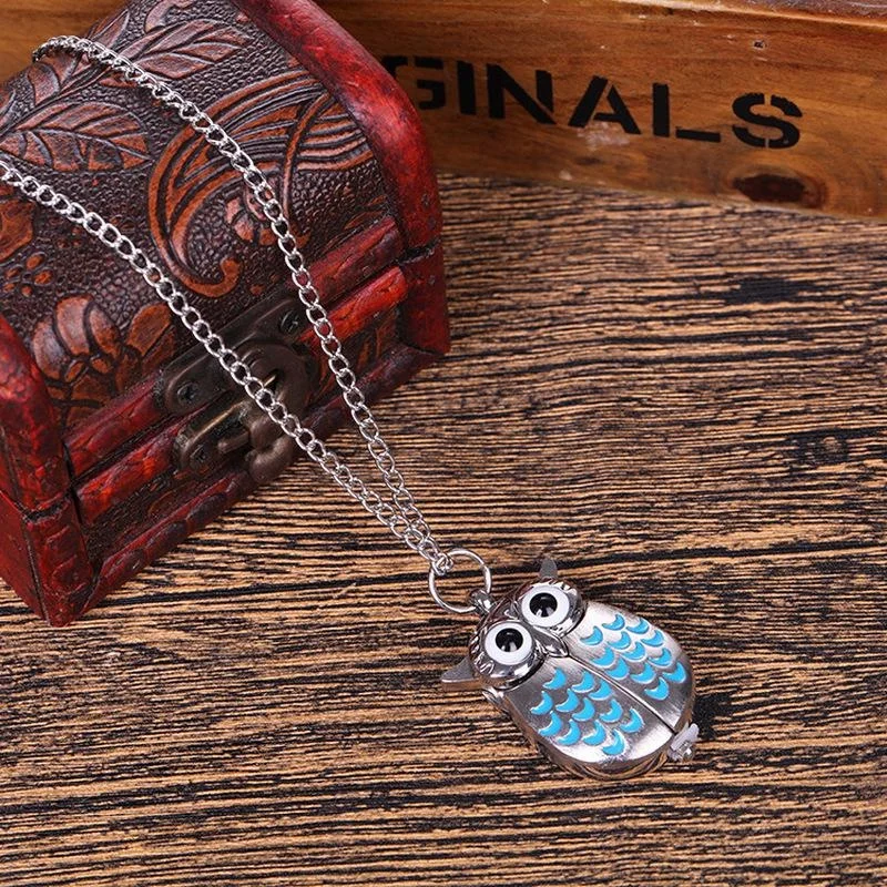 Montre de poche hibou argenté, pendentif aux ailes ouvertes