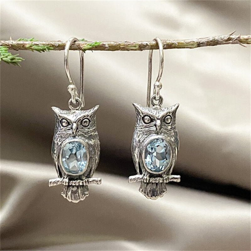 Boucles d’oreilles hibou aux pierres bleu pâle, pendentifs argentés