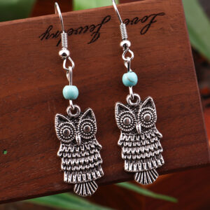 Boucles d’oreilles hibou argenté, perles turquoise